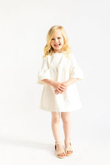 MINI - Cream - Ruffle Bell Dress